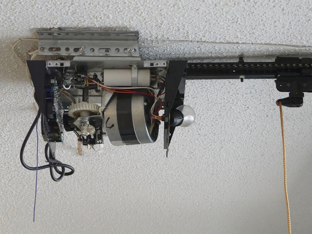 Outdated garage door opener before replacement