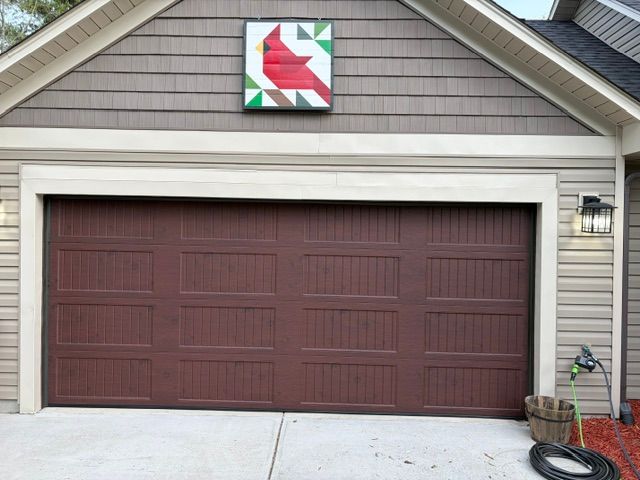 Wood-look carriage style garage door installation