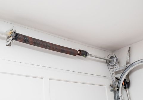Broken torsion spring needing replacement