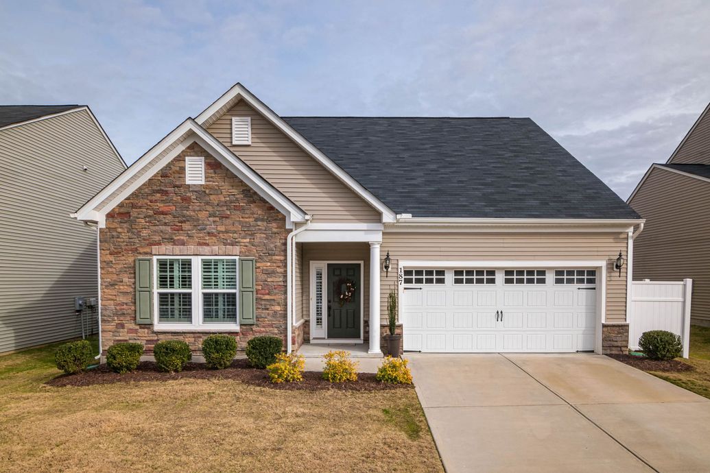 Beautiful home with a residential garage door