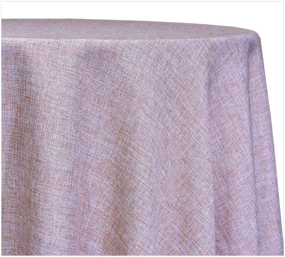 Lavender textured tablecloth draped over a round table