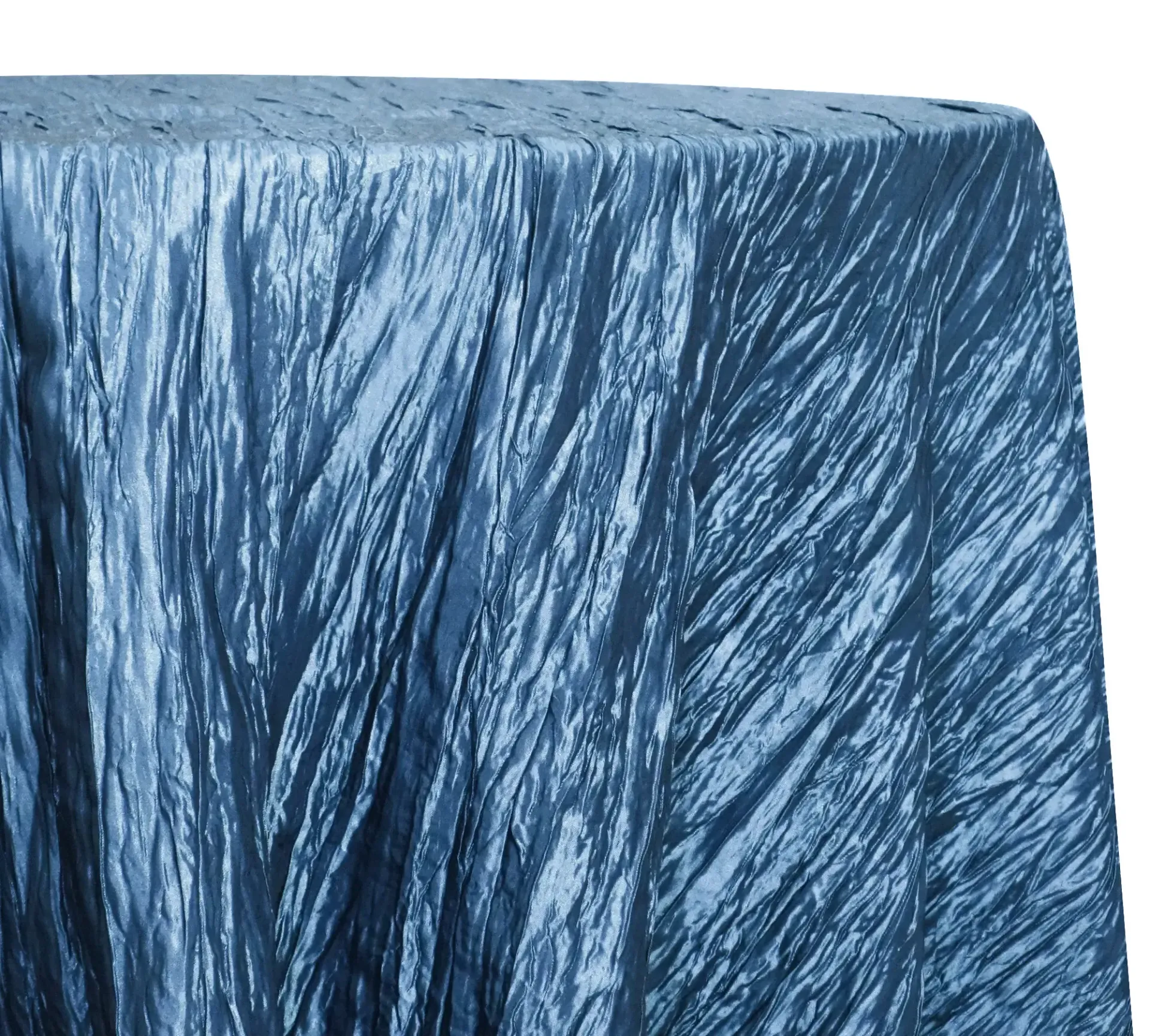 Blue textured fabric draped over a rectangular box, with a smooth top and wrinkled sides