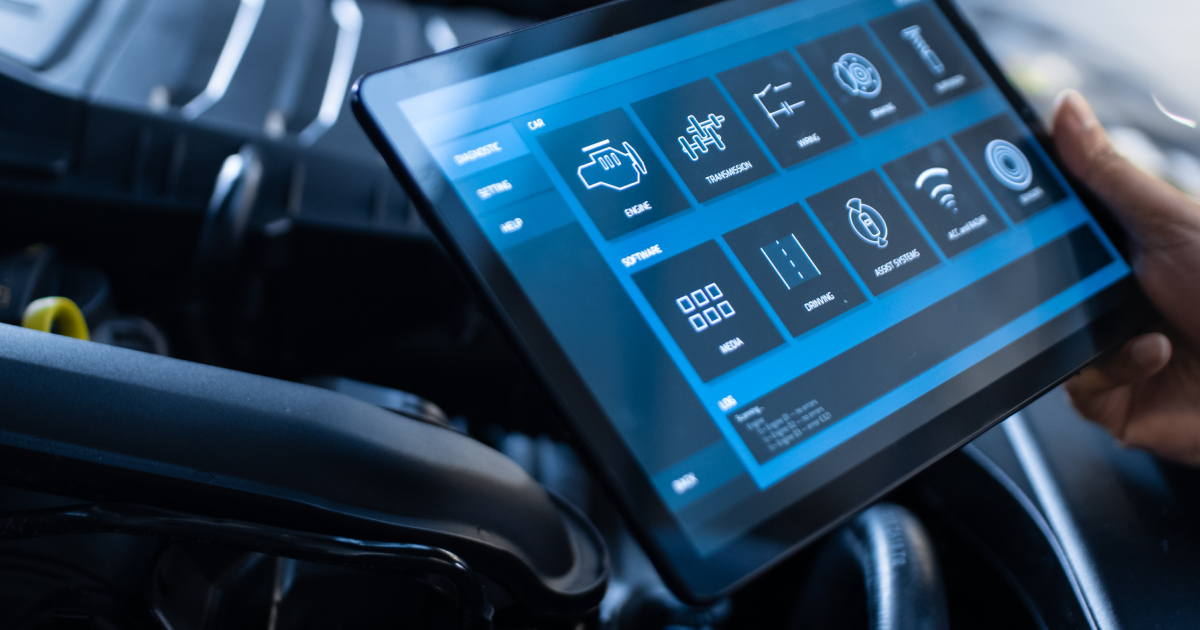 Car dashboard touchscreen displaying blue infotainment controls and app icons