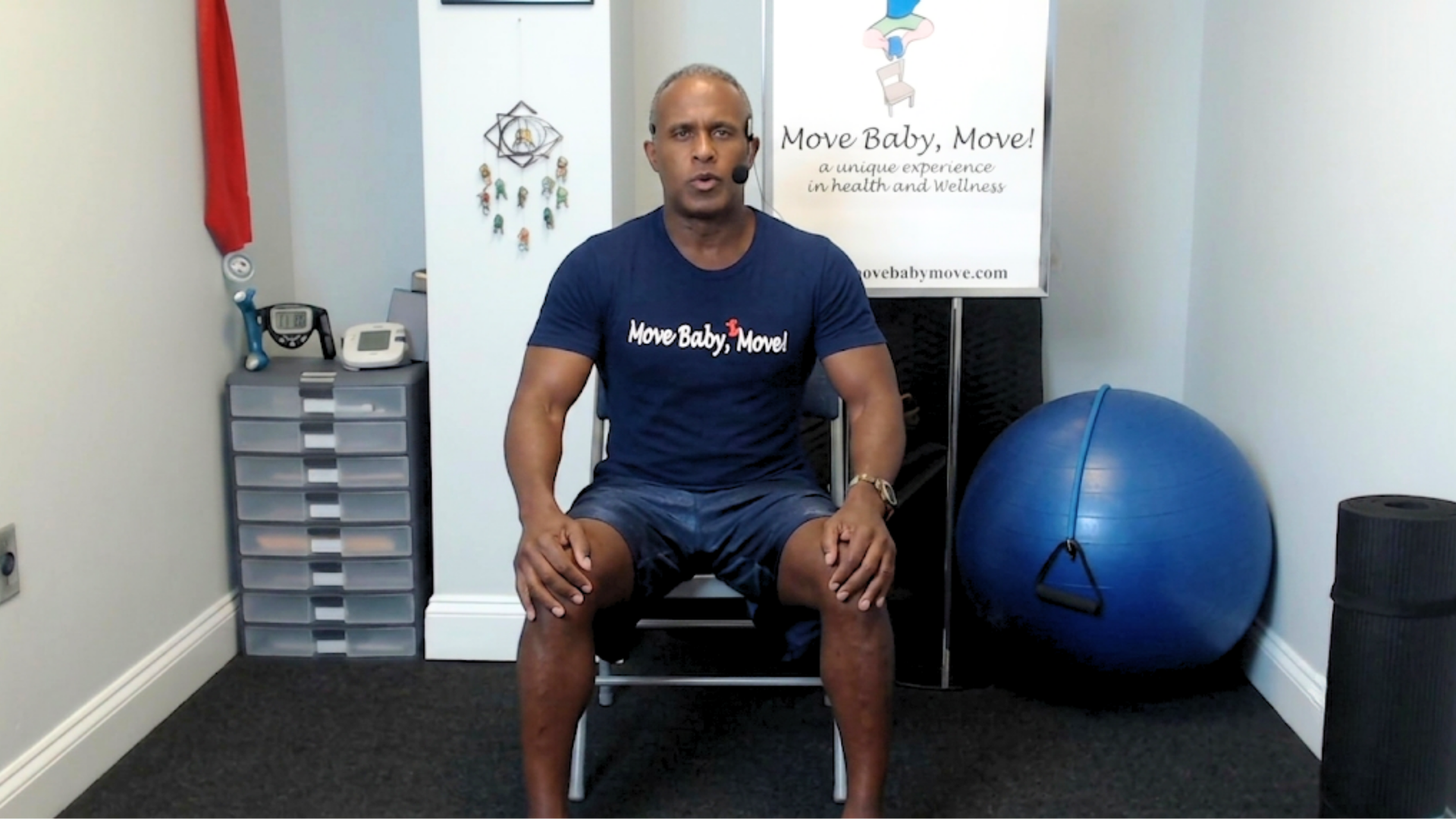 Person doing a standing stretch with one foot on a wooden chair in a bright room