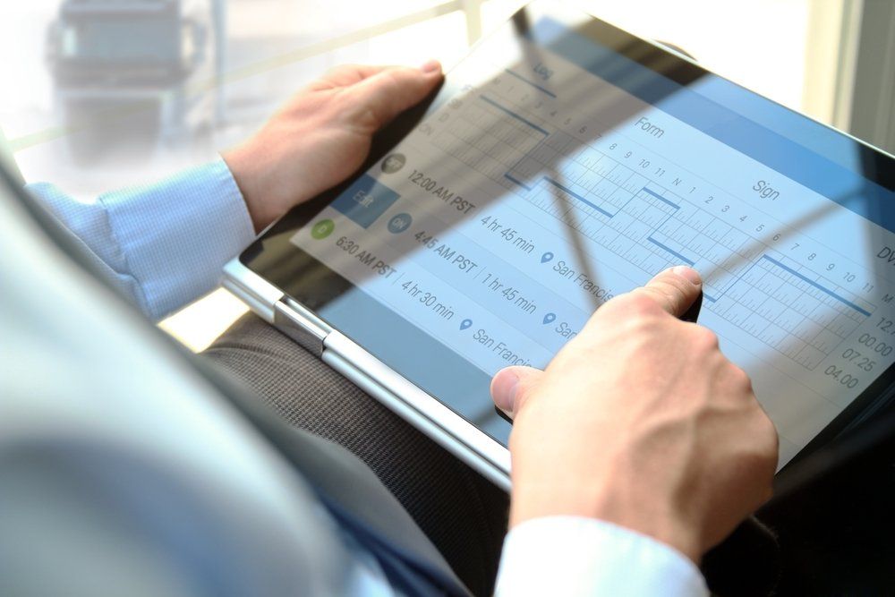 Showing To Truck Driver To Electronic Logbooks On A Tablet - Electronic Work Diaries In Toowoomba, QLD