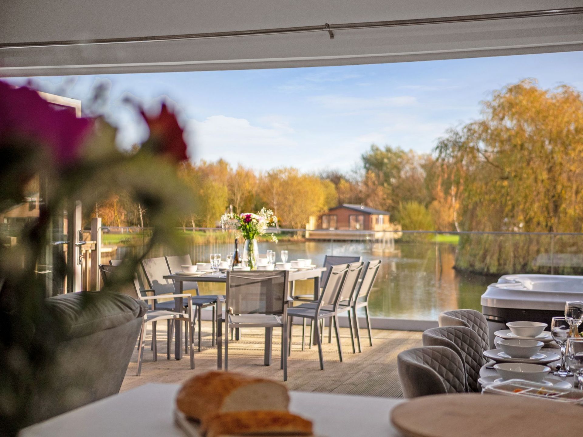 Lakeside lodge exterior with wide accessible doorways and private decking