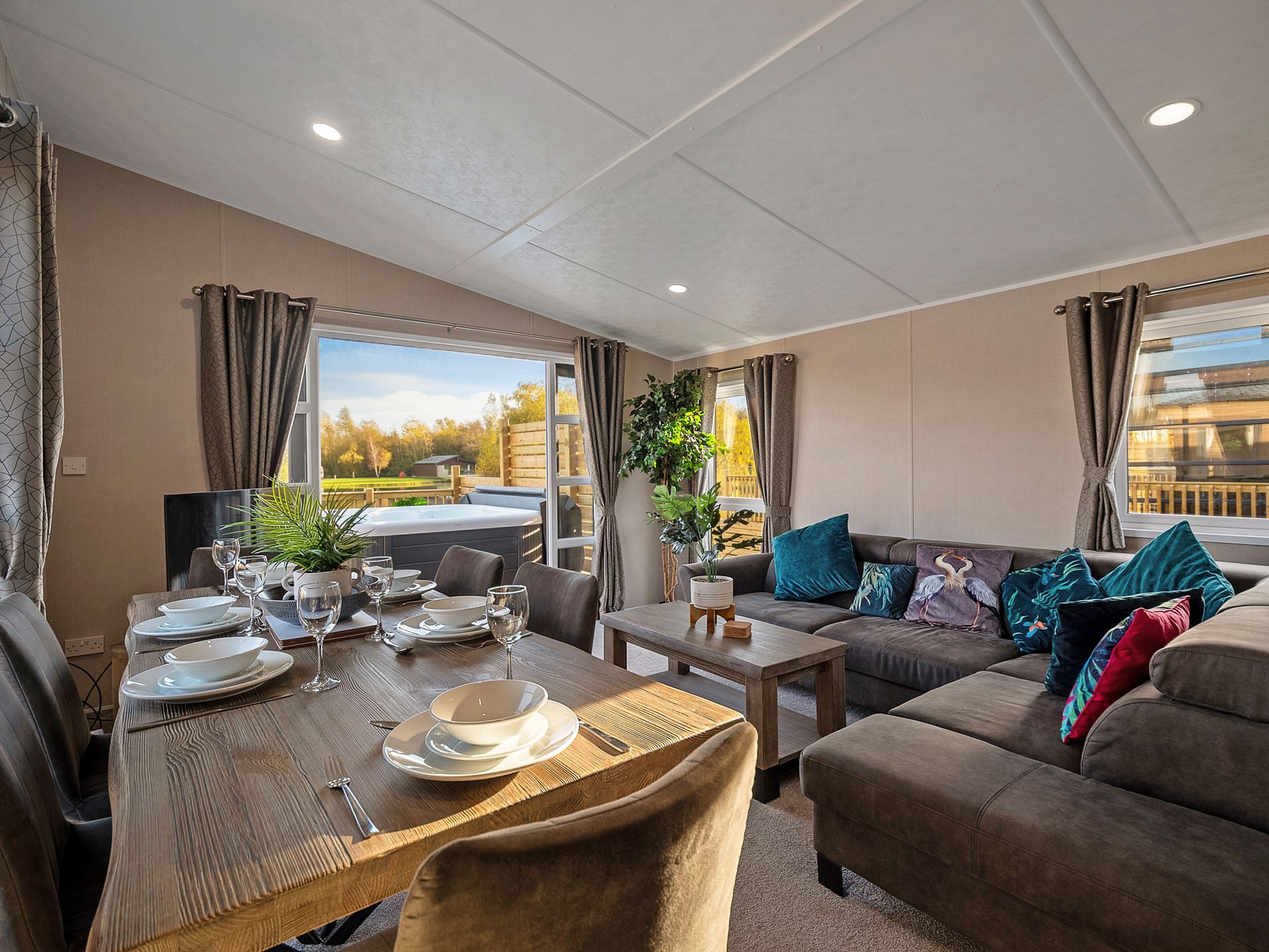 Lakeside lodge exterior with wide accessible doorways and private decking