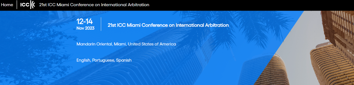 Conference banner with blue background and buildings. Text reads