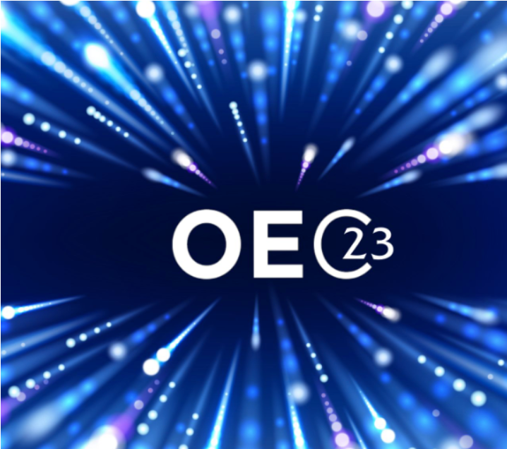 OE23 logo on blue background with radiating light bursts.