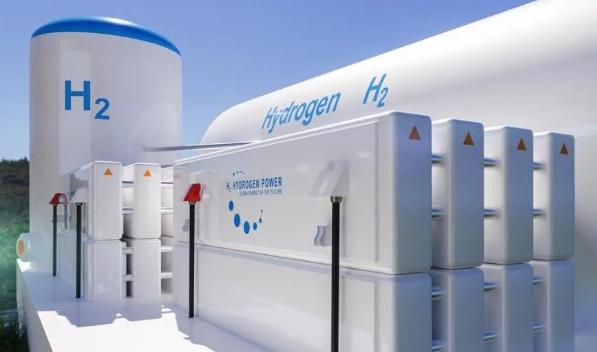 Hydrogen production facility with storage tank and white rectangular processing units.