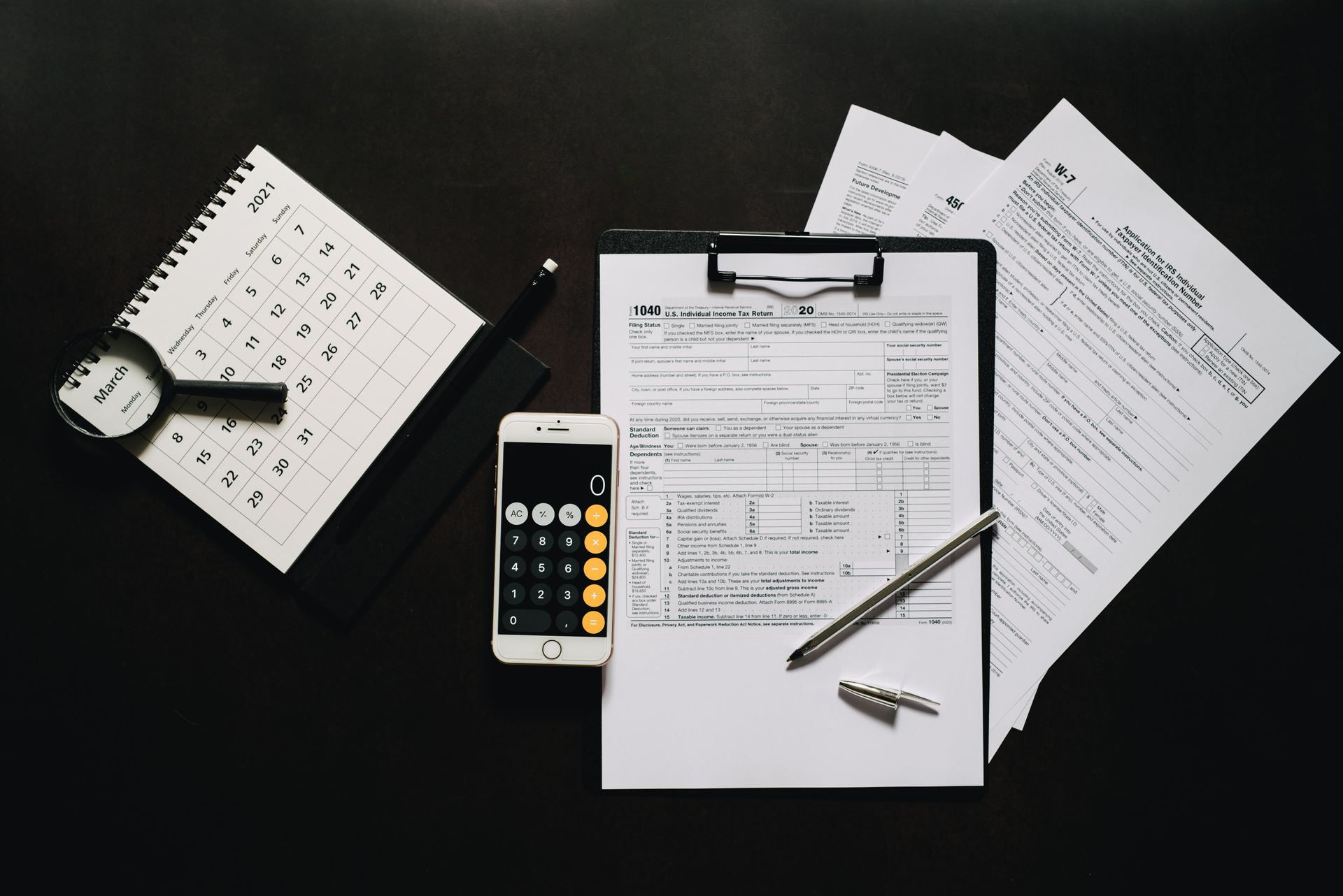 Calendar and calculator with tax forms for Q2 estimated taxes in Athens, TN
