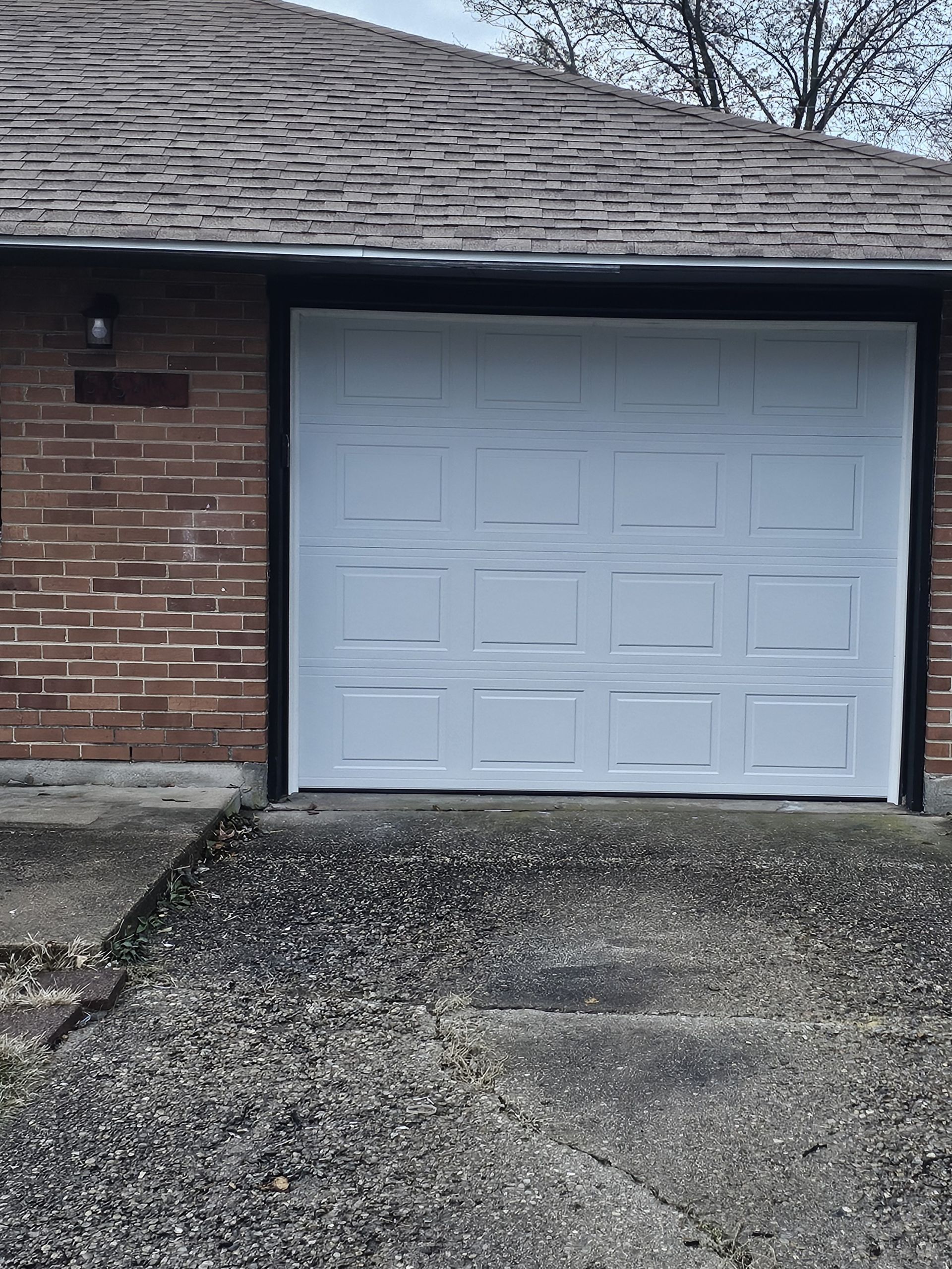 Restored white garage door
