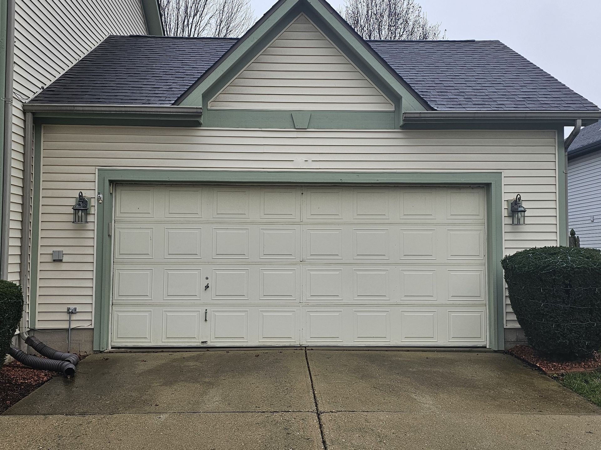 White garage door before replacement
