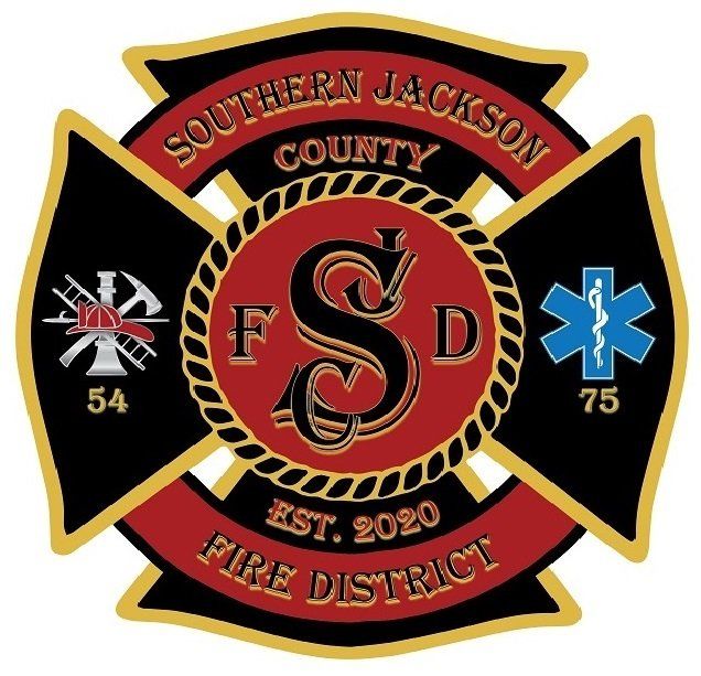Southern Jackson County Fire District emblem with Maltese cross and red, black, and gold details