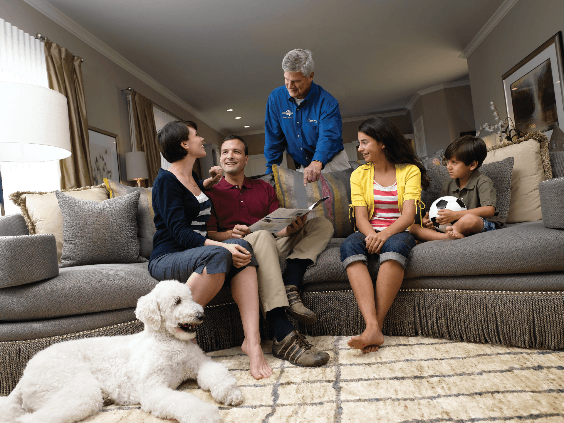 HVAC Technician Talking to a Family