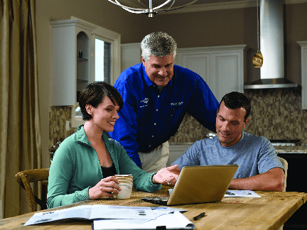 HVAC Technician Discussing With His Customers