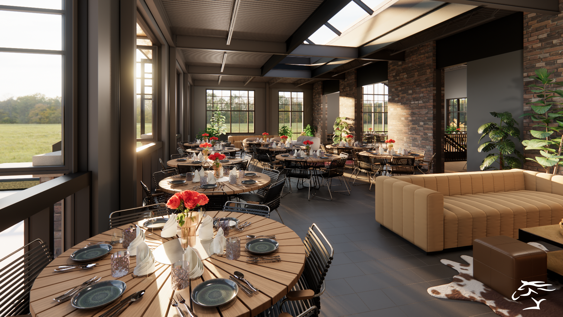 Restaurant interior with round tables, chairs, sofa, brick walls, and large windows with natural light.