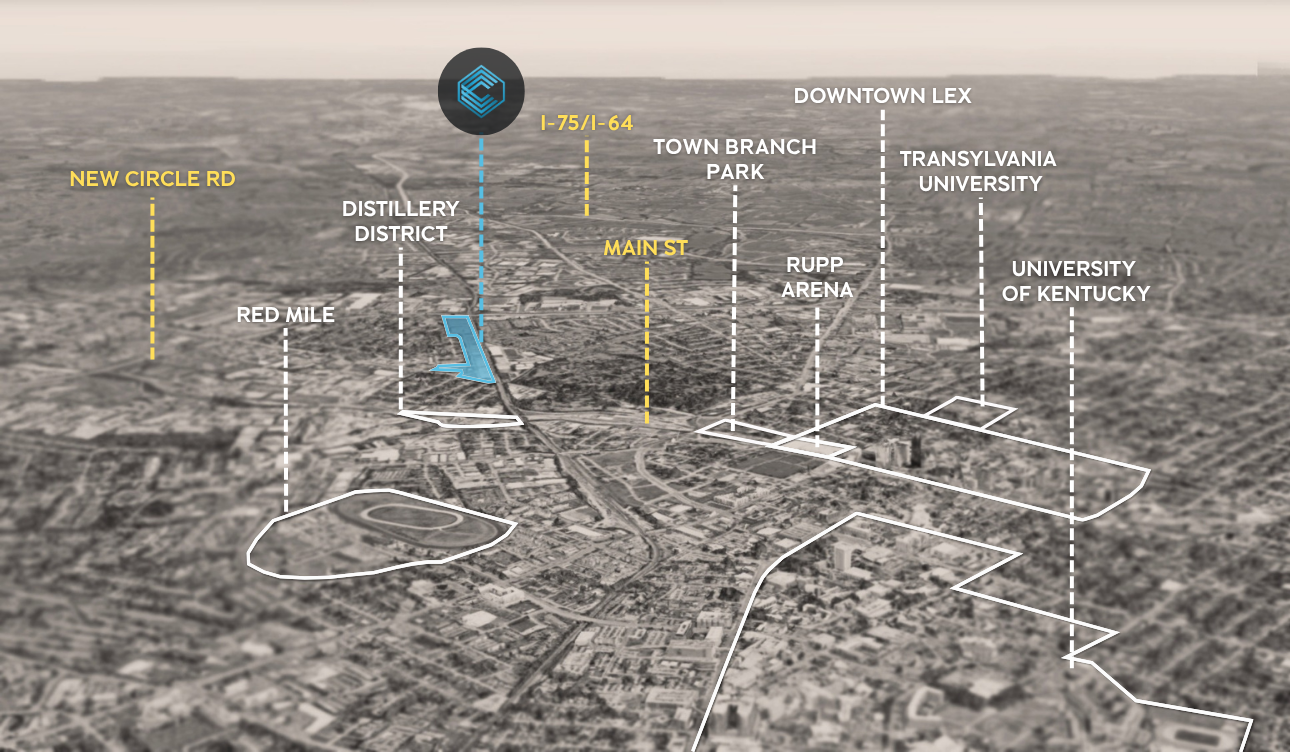 Aerial view of a city with labeled landmarks, a blue arrow points to a building, and a logo is visible.
