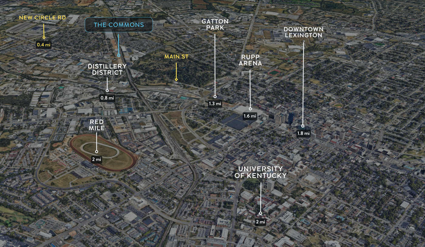 Aerial view of a city with labeled landmarks, a blue arrow points to a building, and a logo is visible.