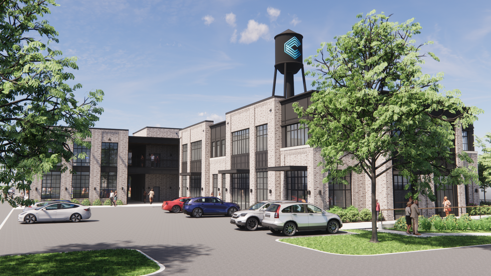 Modern brick building with a water tower, parking lot, and parked cars under a blue sky.