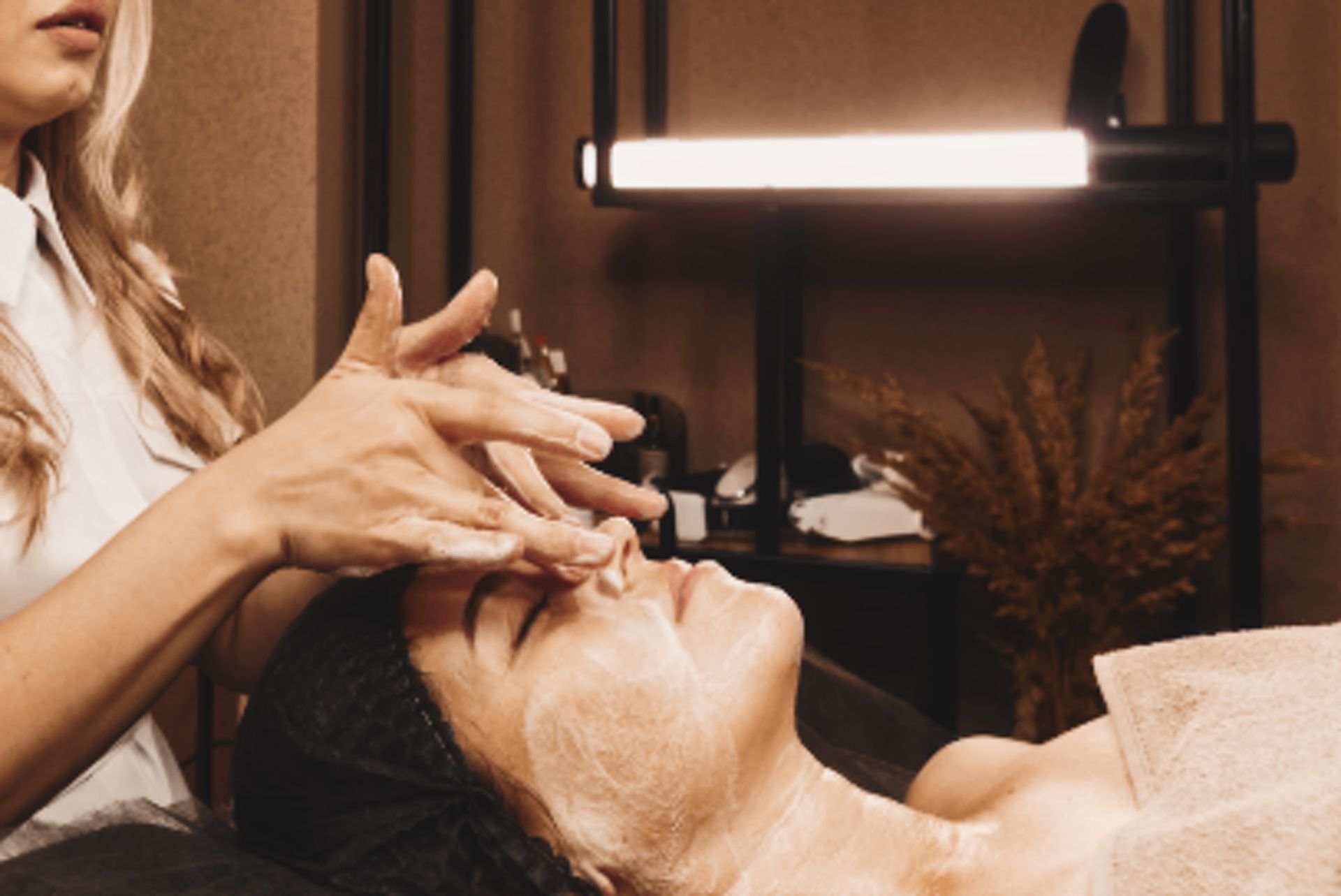 An esthetician applying a personalized facial treatment