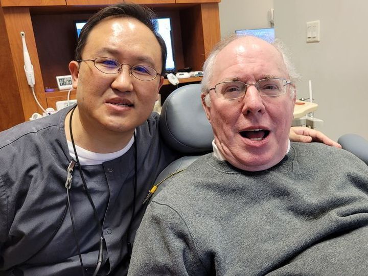Braddock Family Dental - Dr. Cho with Happy Patient