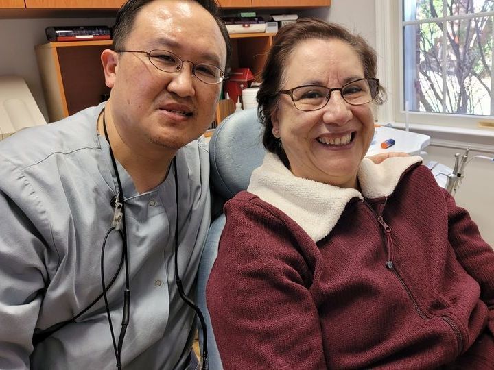 Braddock Family Dental - Dr. Cho with Happy Patient