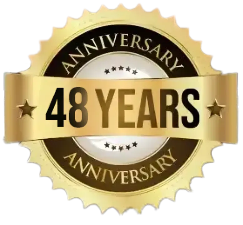 Gold anniversary badge reading “48 YEARS” with black circular accents and gold ribbon banner