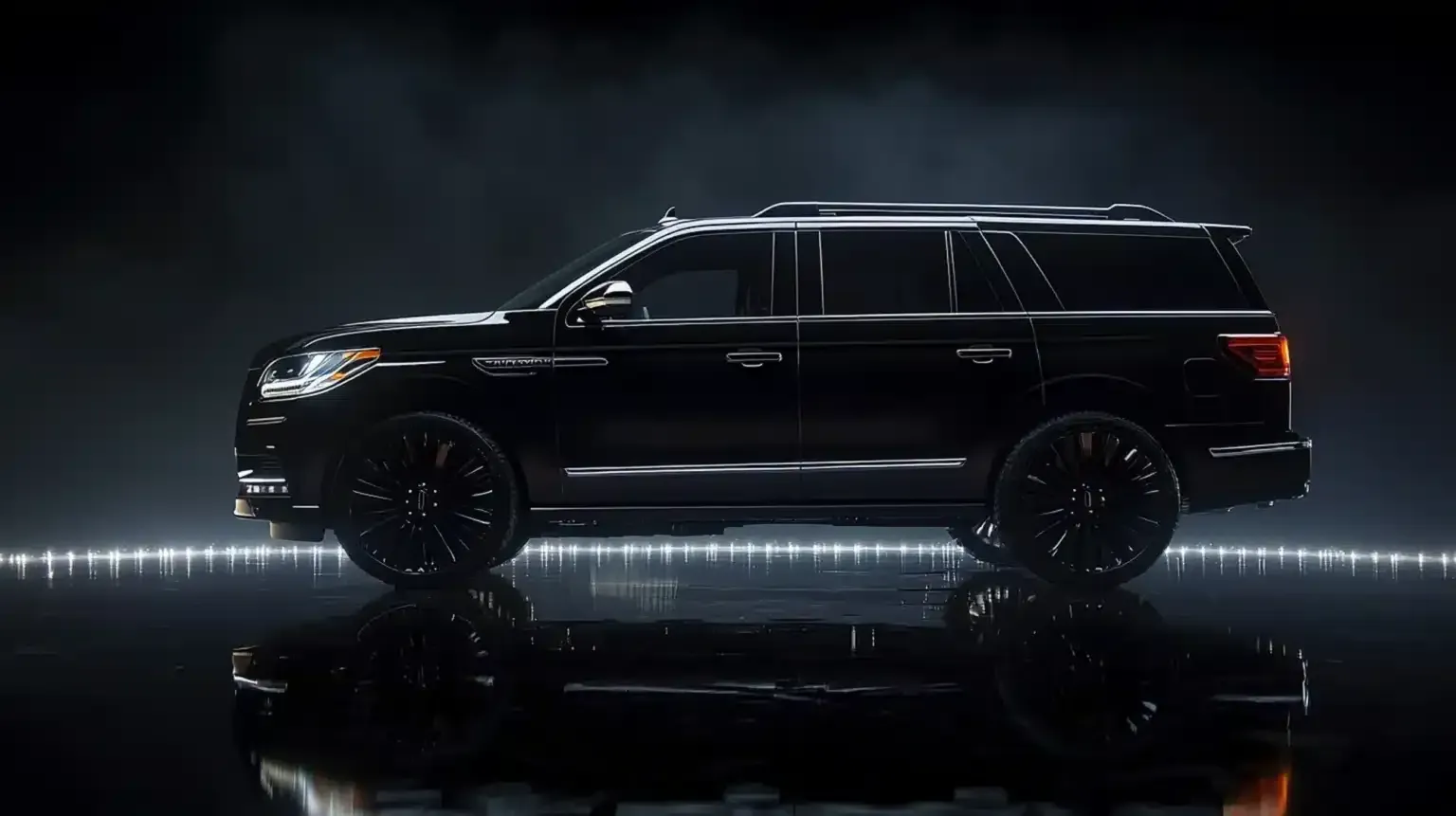 Glossy black SUV in side profile on a dark studio background with reflective floor.