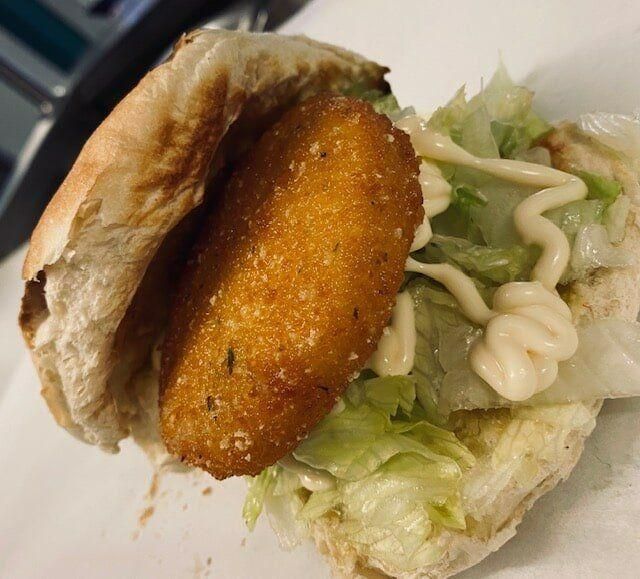 A Close up Of a Fried Fish Sandwich — Stones Oysters & Shed Takeaway in Harrington, NSW