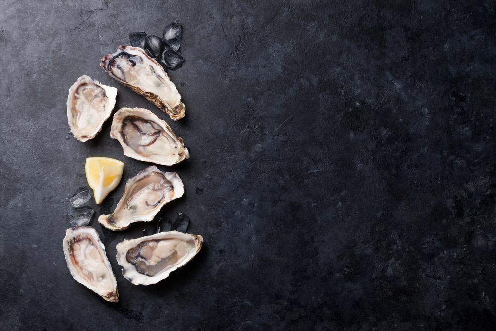 Oysters on A Black Background — Stones Oysters & Shed Takeaway in Harrington, NSW