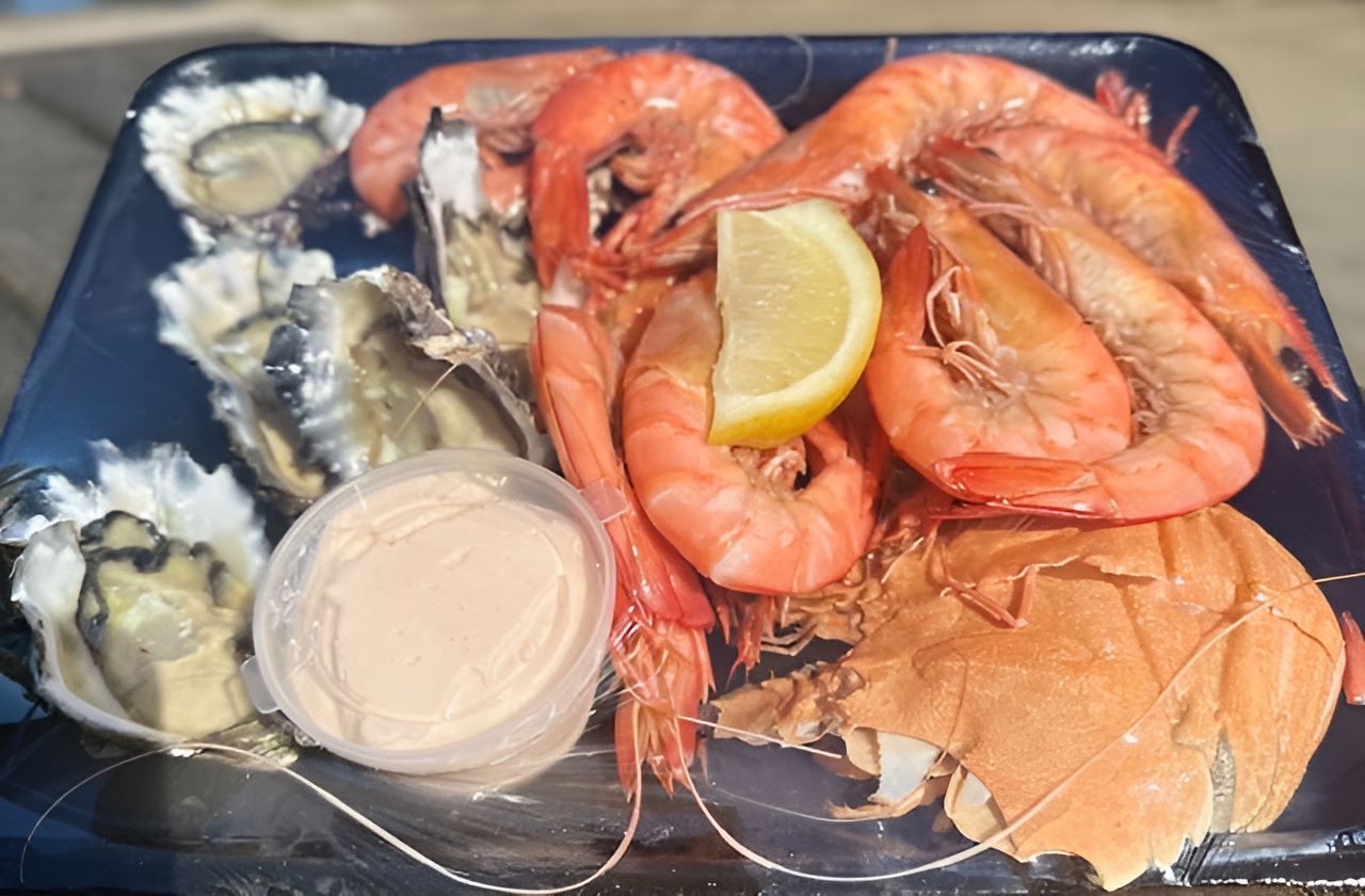 A Blue Plate Topped with Shrimp — Stones Oysters & Shed Takeaway in Taree, NSW