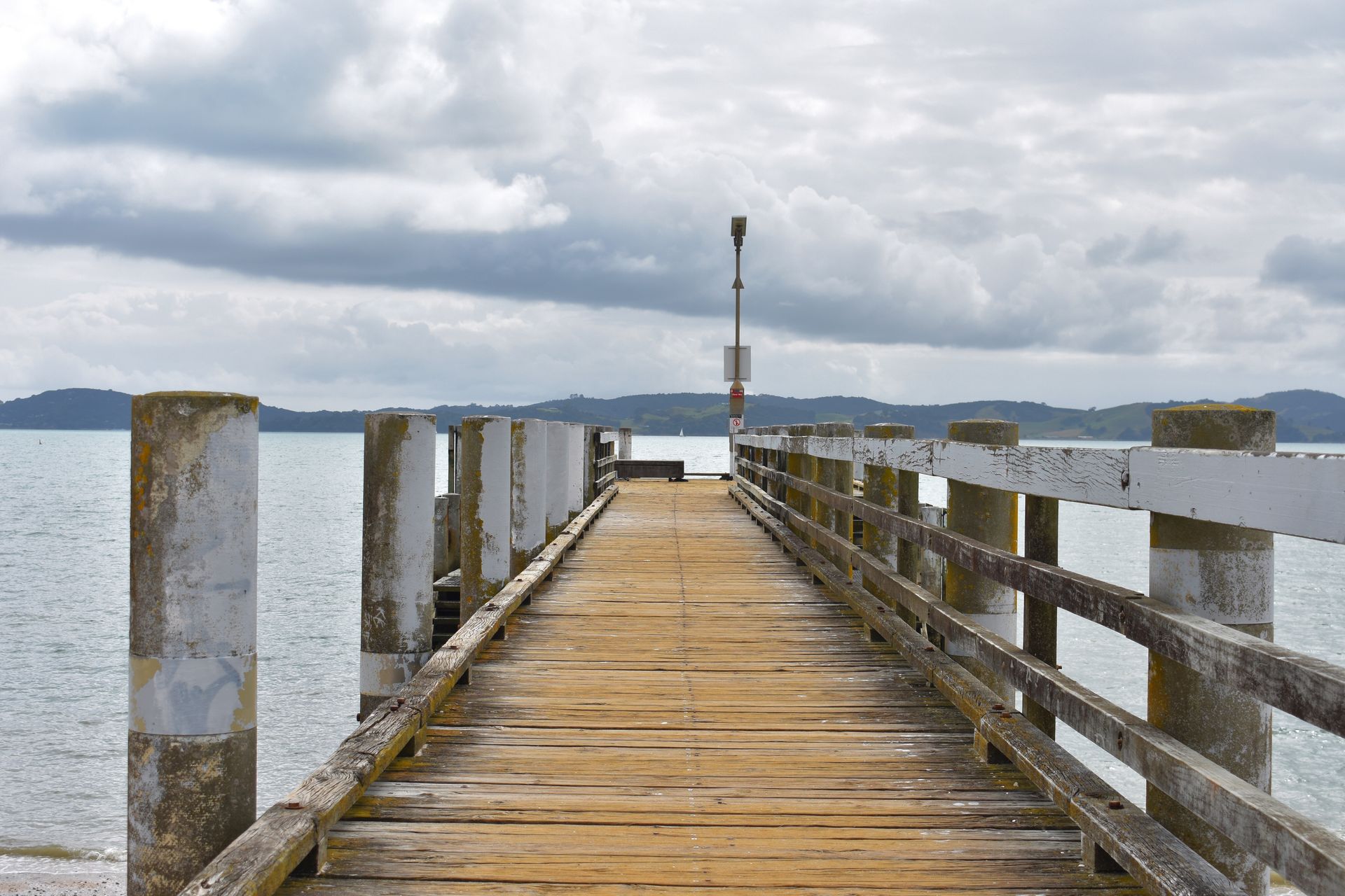 A Wooden Pier Leading into the Ocean — Stones Oysters & Shed Takeaway in Taree, NSW