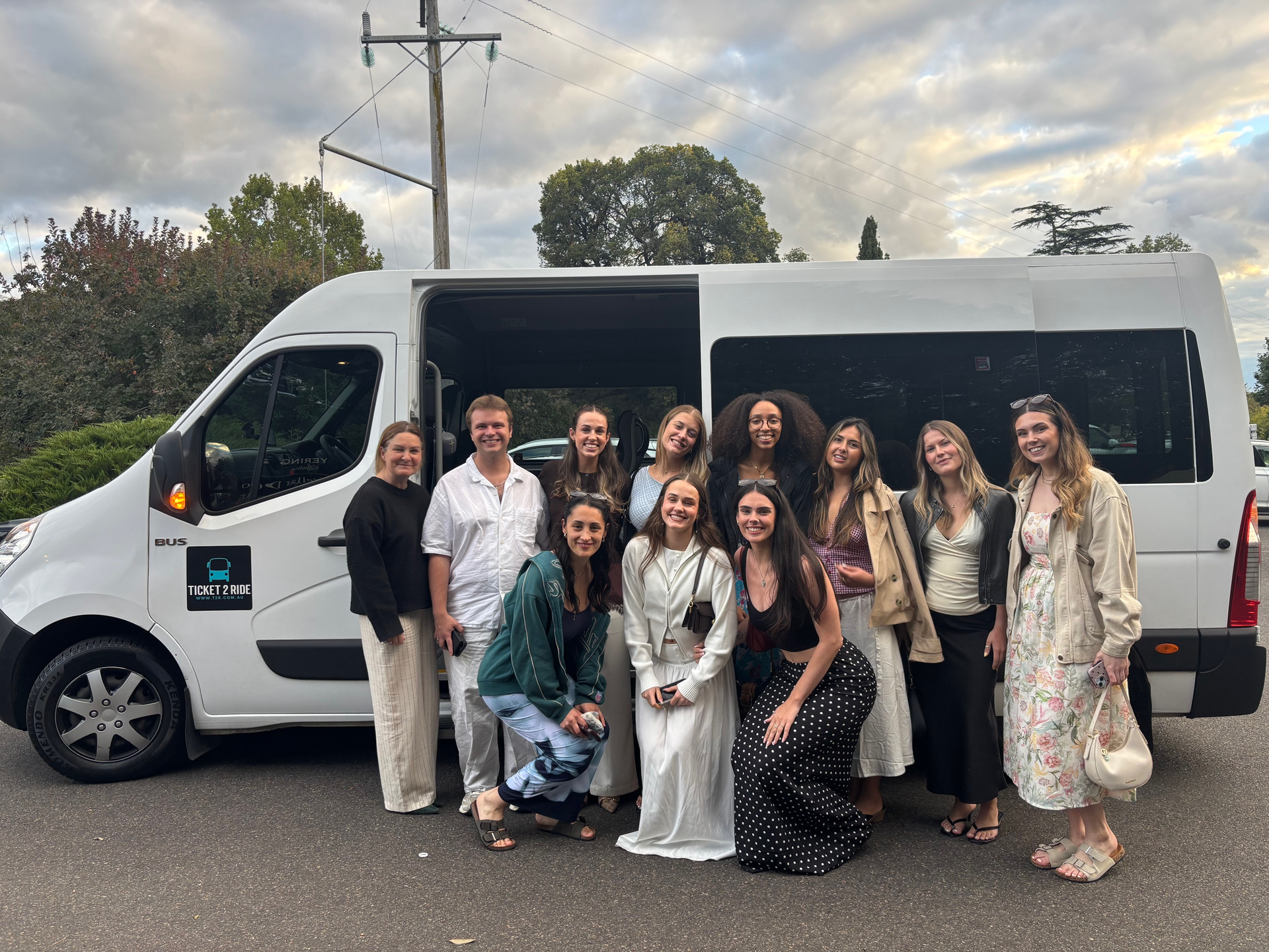 A group in a Ticket 2 Ride minibus, enjoying a winery day trip.
