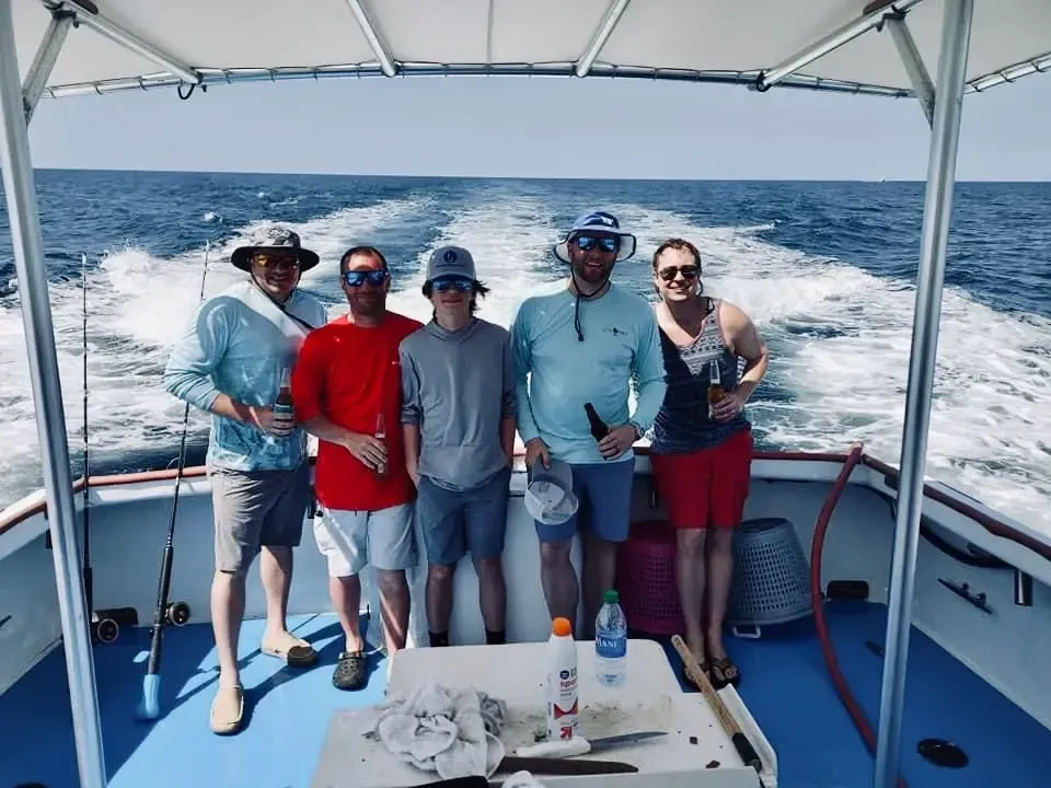 Group of friends on fishing charter Panama City Beach with Reel Groovy