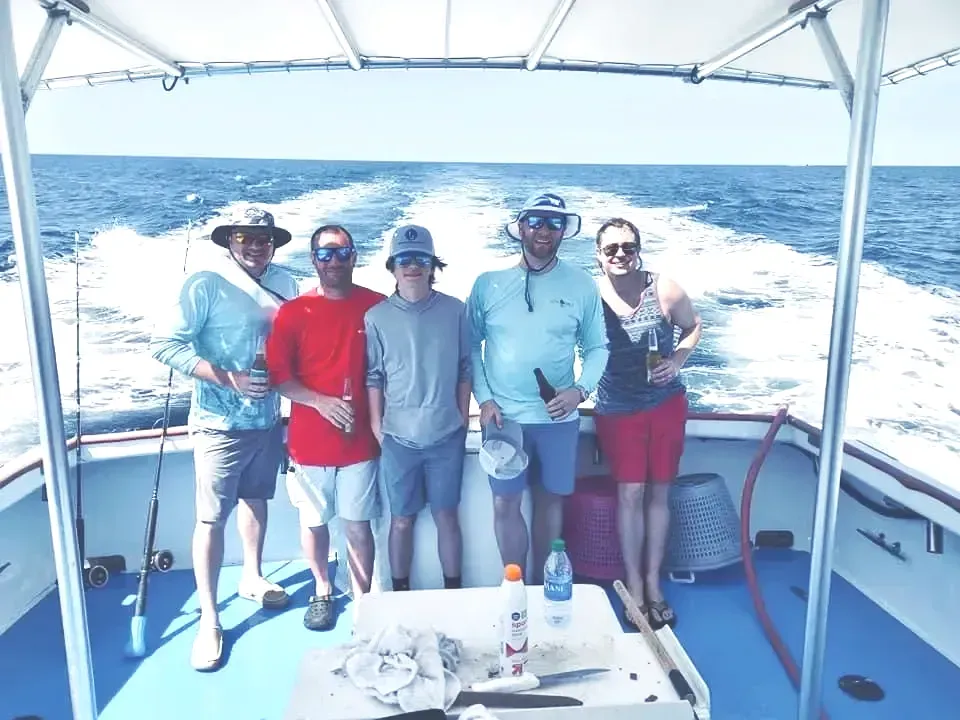 Group of friends on private 8 hour fishing charter Panama City Beach with Reel Groovy Experiences