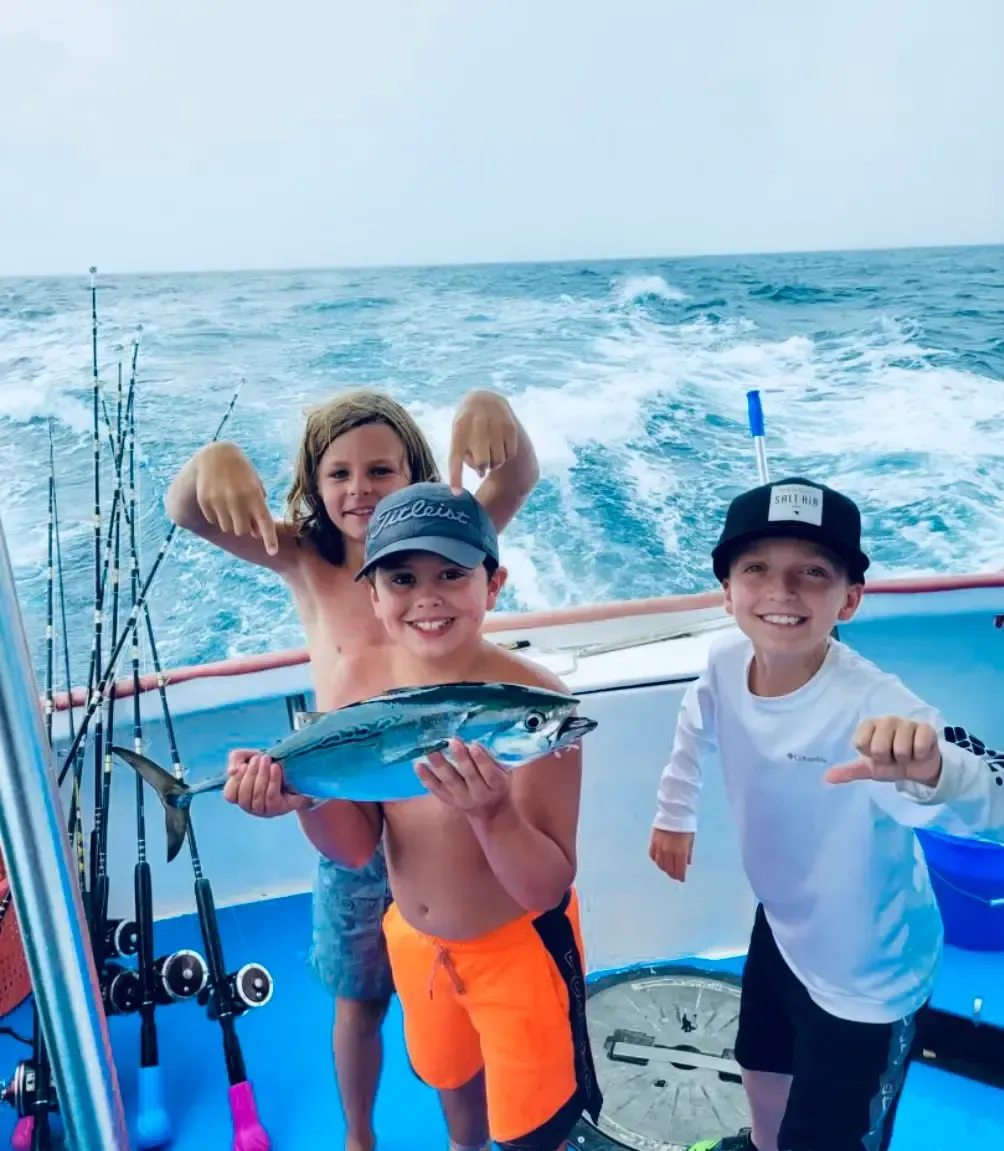 Children deep sea fishing on 10 hour fishing charter Panama City Beach with Reel Groovy