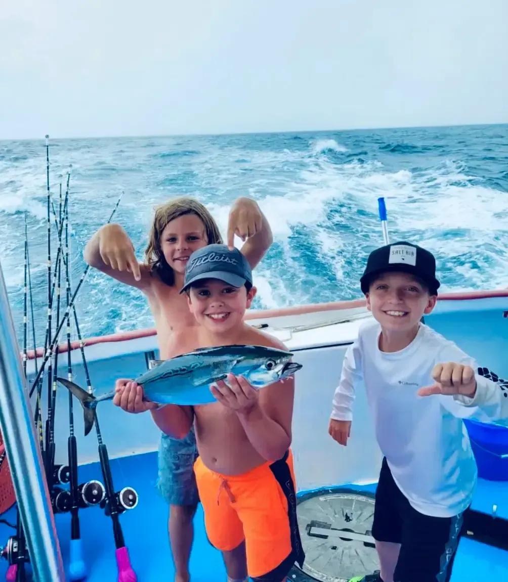 Children fishing on family friendly 8 hour fishing charter Panama City Beach with Reel Groovy Experiences