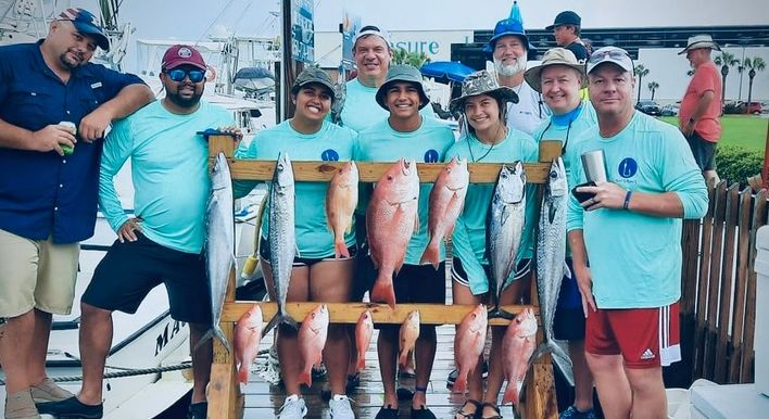Group of friends after fishing charter Panama City Beach with Reel Groovy Experiences