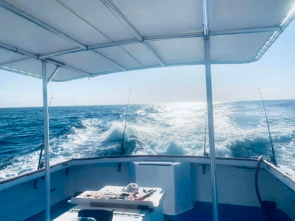 The back deck of the best fishing charter in Panama City Beach, Florida. Reel Groovy Experiences.