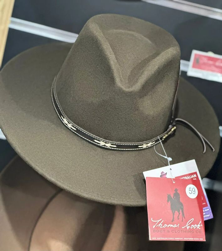A Brown Hat with A Tag that Says Thomas Hook — Country Charm in Charmhaven, NSW
