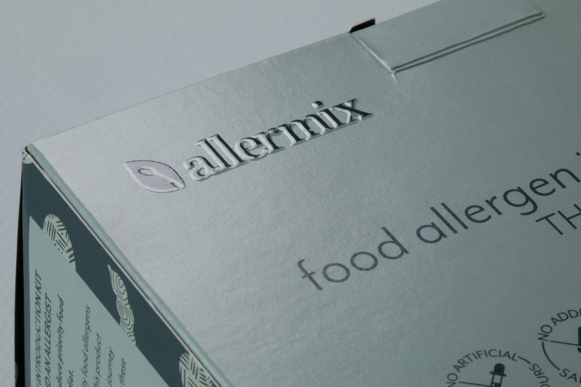 Allermix food allergy test kit box with white and teal packaging