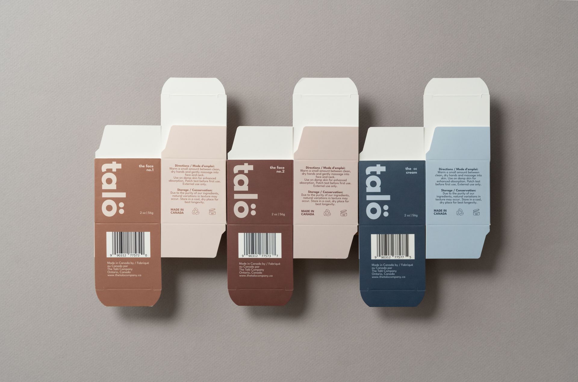 Four colorful folded product boxes arranged in a row on a light background