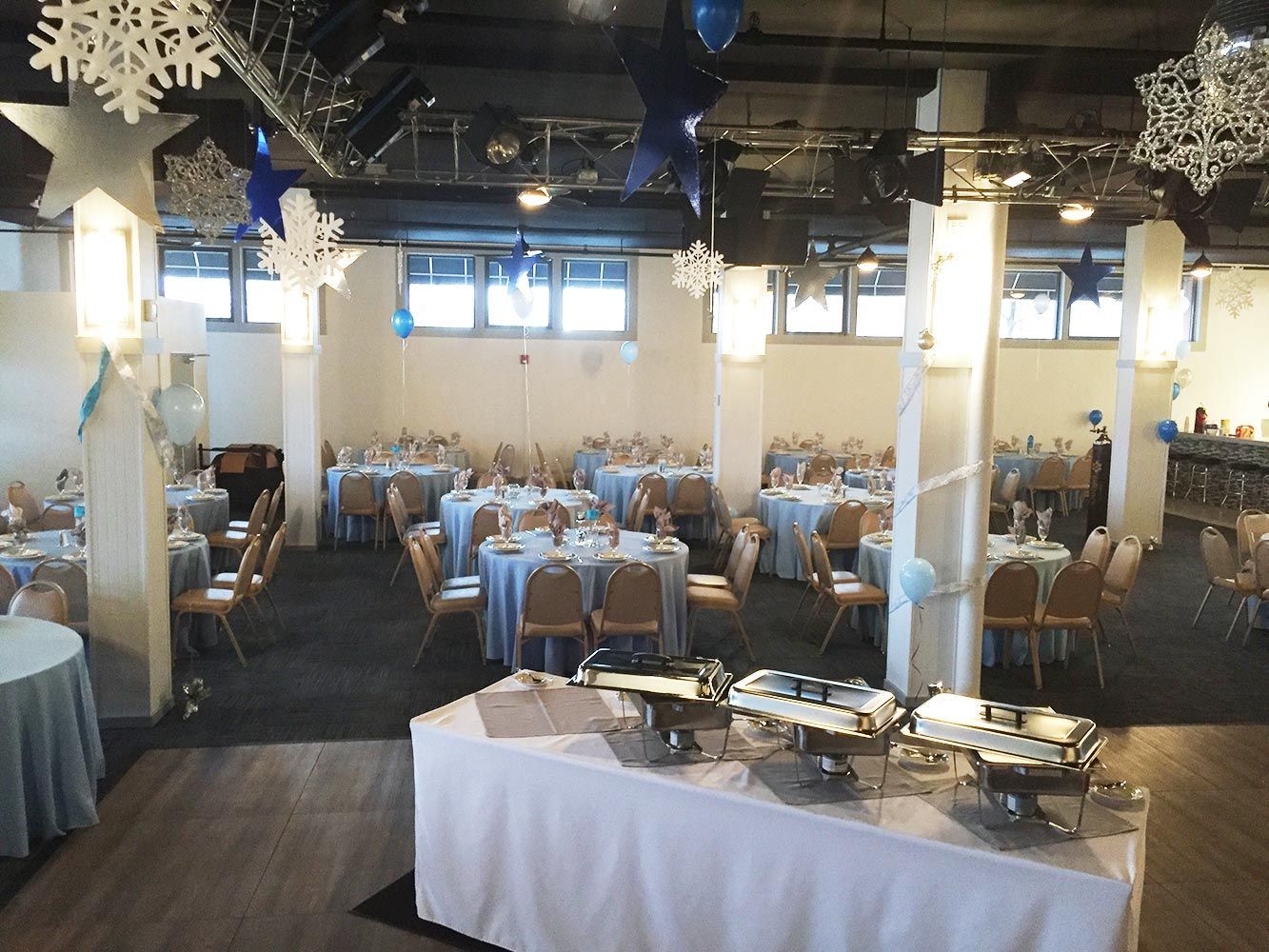 event space set up with decorations and catering
