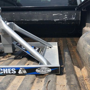 A ladder is sitting in the back of a truck.