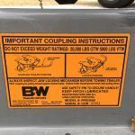 A close up of a label on a trailer that says `` important coupling instructions ''.