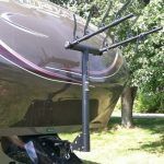 Black fishing rod holder mounted on a boat.