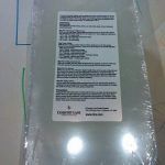 A box with a label on it is sitting on a table.
