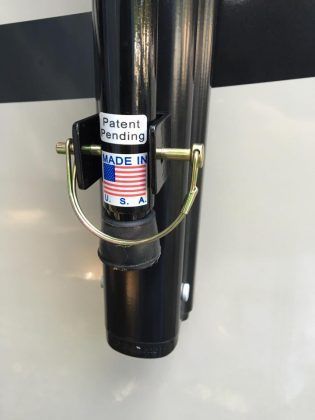 A black pole with a sticker on it that says patent pending made in the usa.