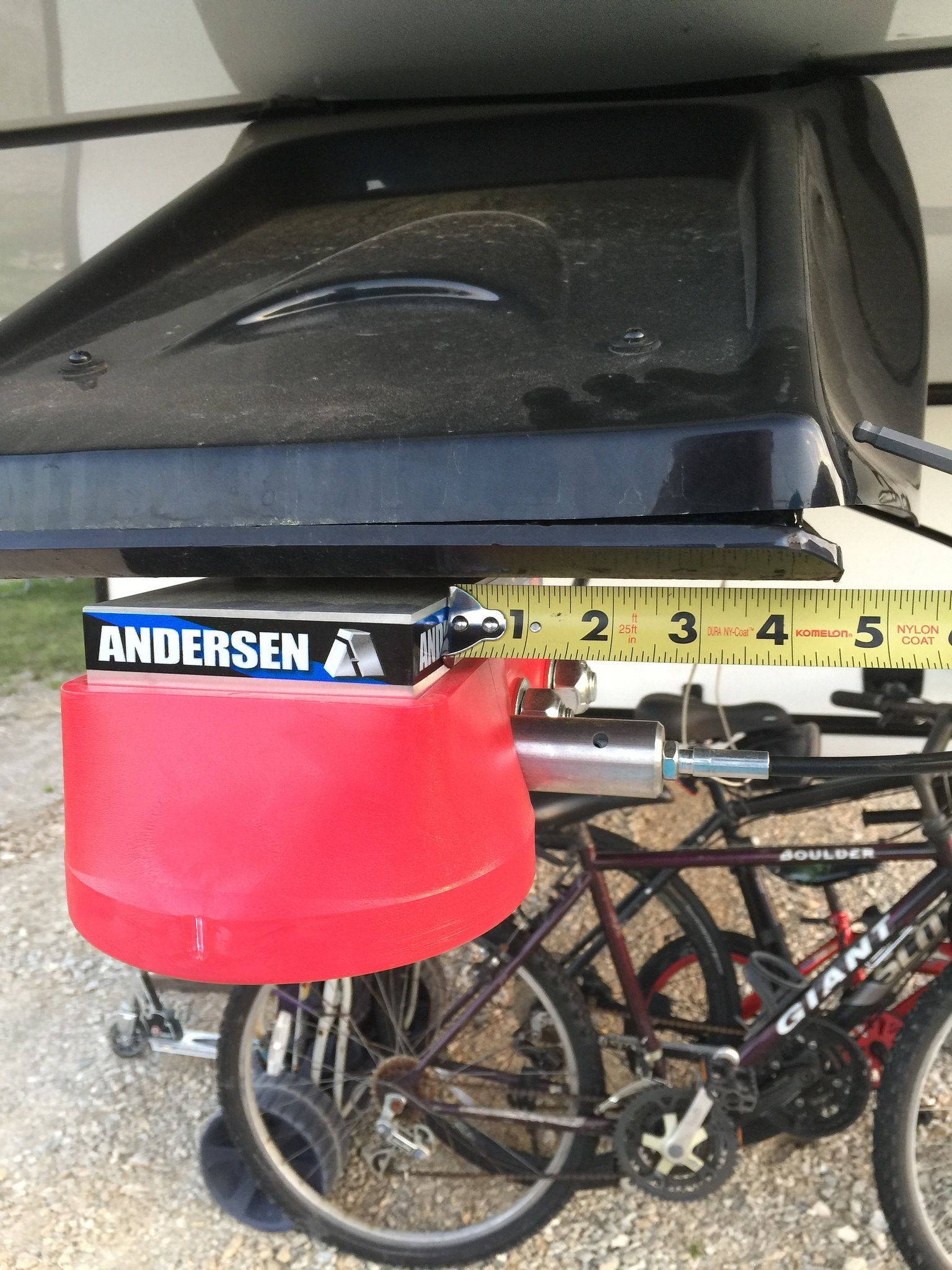 A red container with the word andersen on it